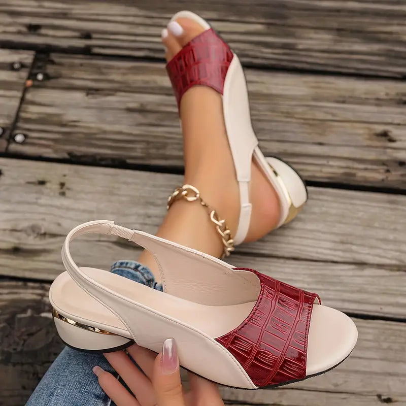 Side angle of Women's wedge sandals displaying low heel height and open-toe silhouette