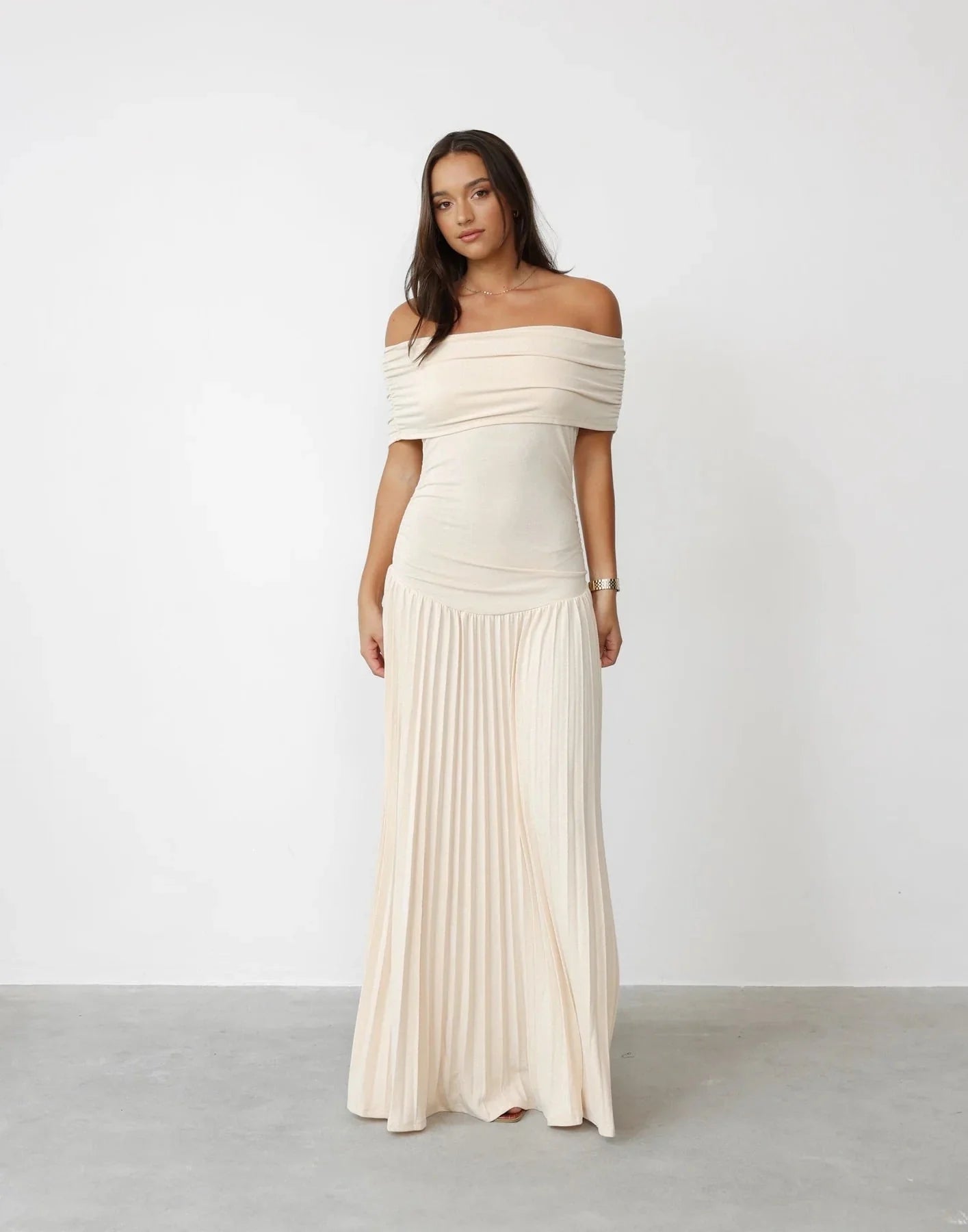 Off shoulder maxi dress with draped bodice and pleated skirt in cream tone