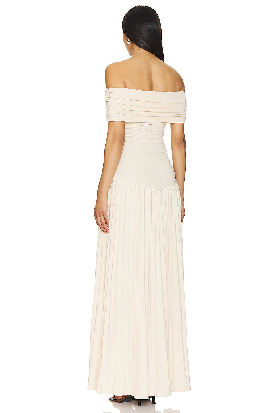 Close view of draped neckline and ruched detailing on bodice