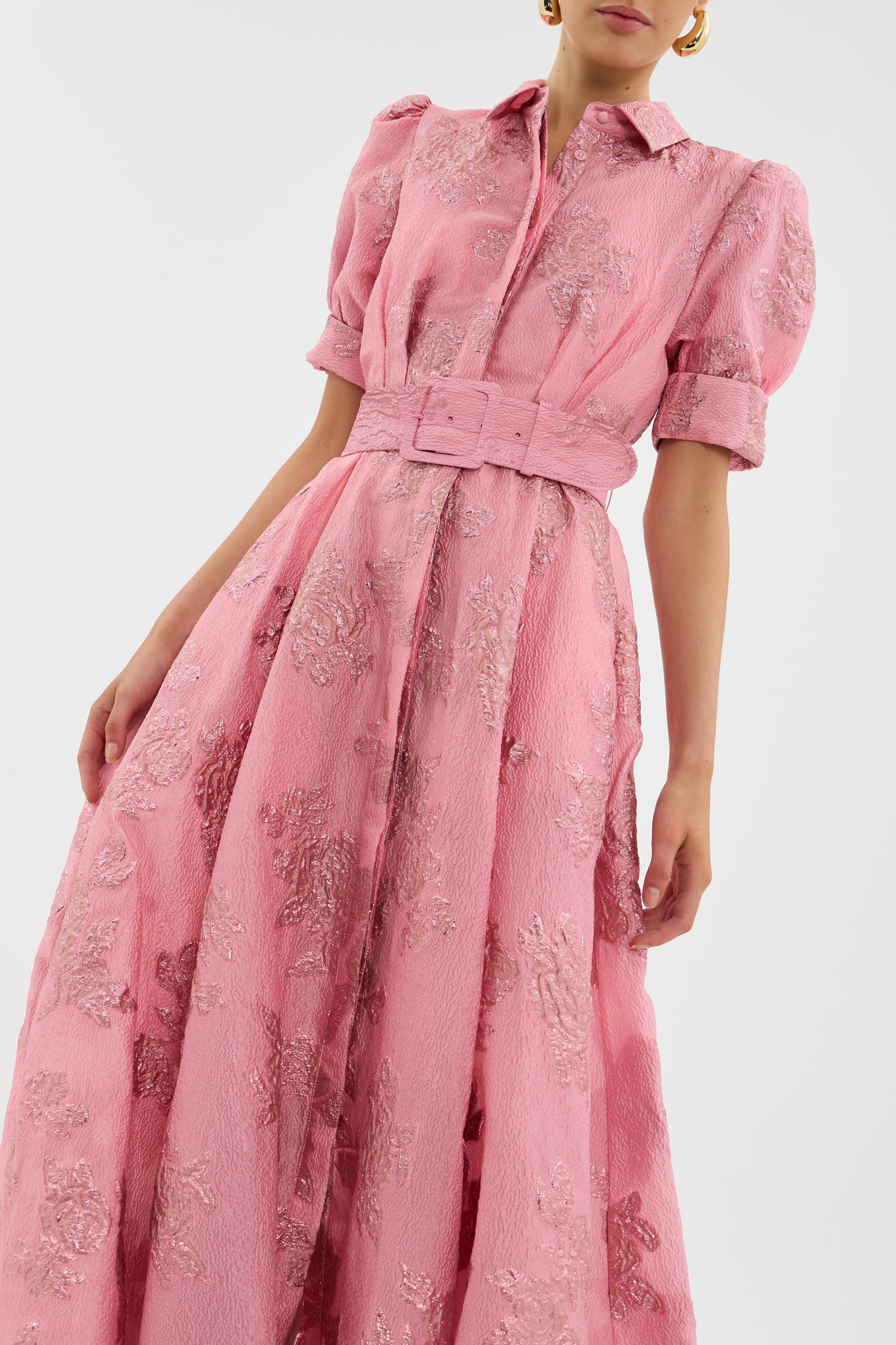 Full-length pink maxi dress with textured jacquard weave and flowing A-line skirt