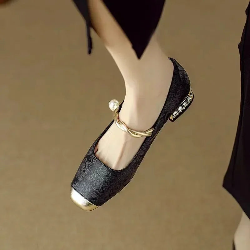 Overhead view of Women's Pearl Strap Mary Jane Shoes displaying metallic square toe and pearl accent