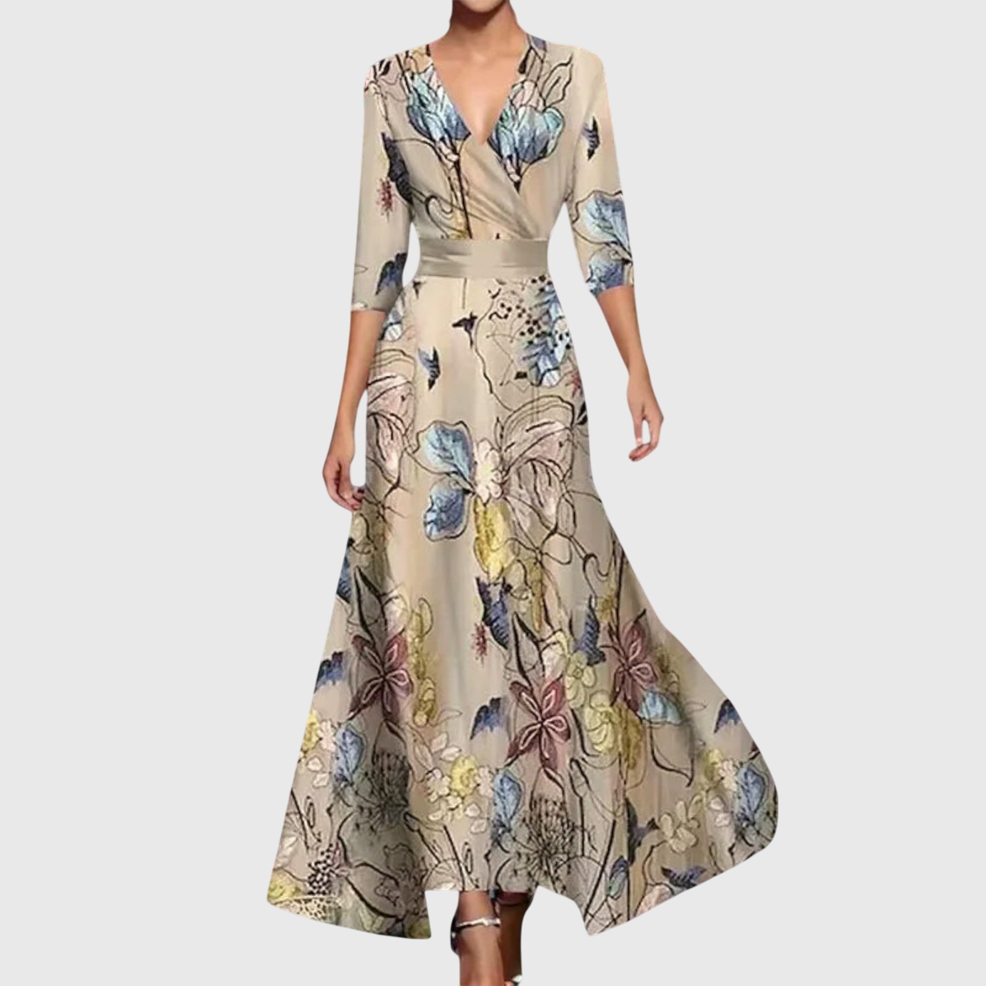 Side angle of maxi floral dress showing fitted waist and A-line skirt movement