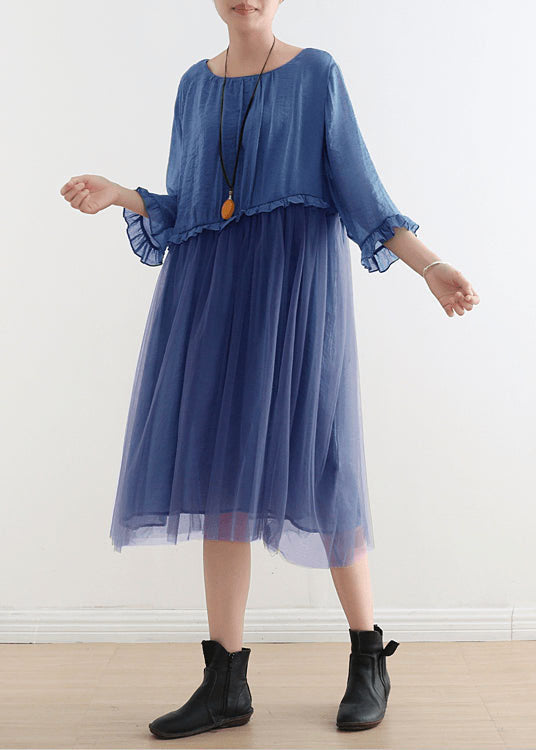 Side angle of flowing summer dress showing layered construction and sleeve detail