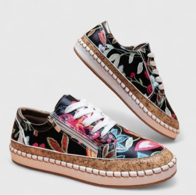 Women's orthopedic shoes with black floral embroidered upper and jute espadrille sole detail