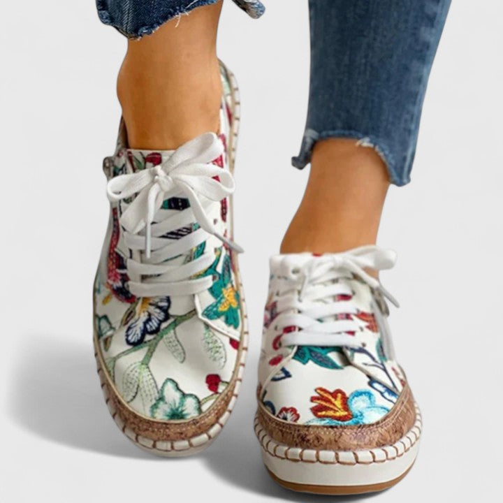 Women's floral sneakers with slip-resistant sole and contoured footbed construction