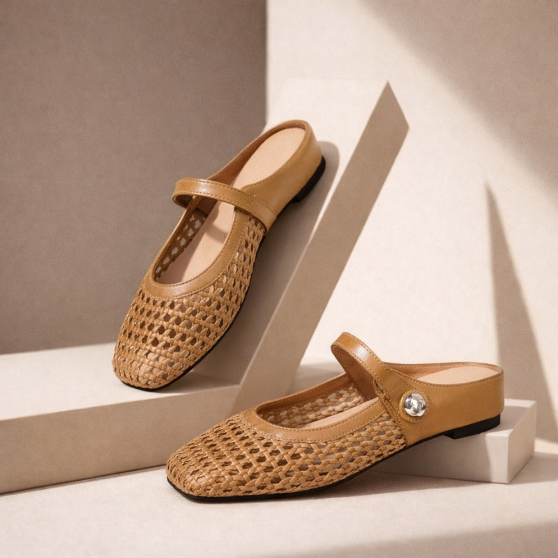 Overhead view of Mary Jane mules showing intricate open-weave pattern and polished button closure