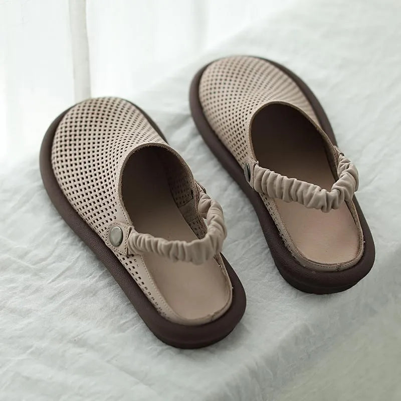 Overhead view of women's cushioned sandals showing elasticated adjustable straps and contoured footbed design