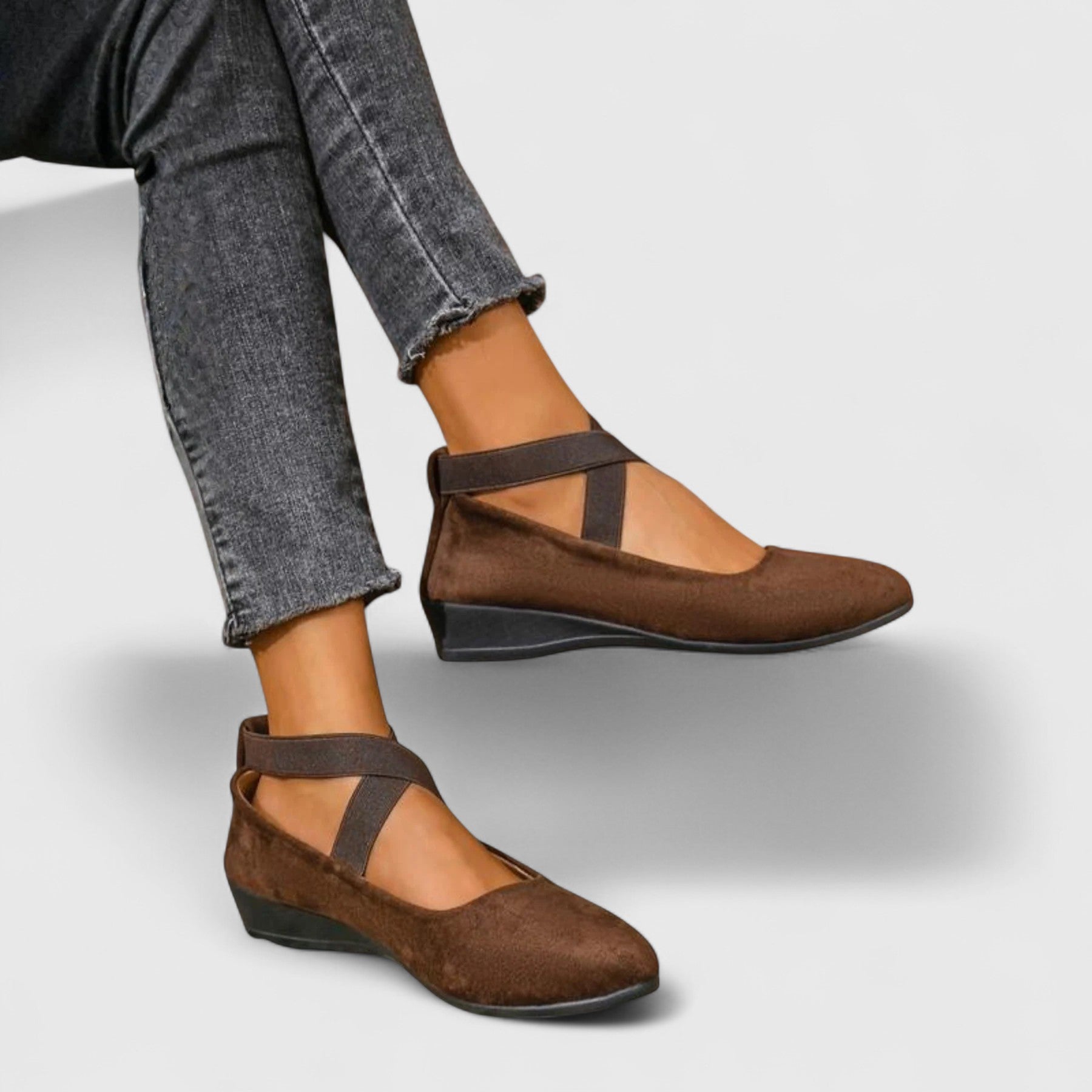 Side angle of women's mary jane flats displaying flat sole and smooth finish upper material