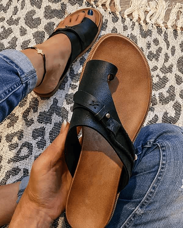 Women's contoured sandals with toe ring closure and wide strap for secure all-day fit