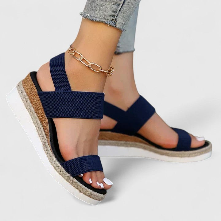 Women's comfort sandals with natural jute-wrapped sole and soft elastic straps for everyday wear