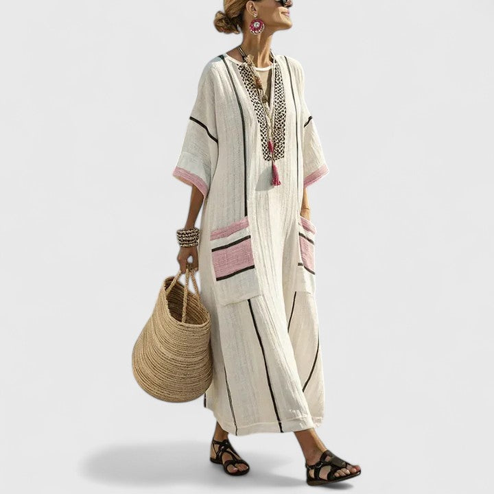 Close-up of V-neckline and contrast trim detailing on Elegant Bohemian Dress