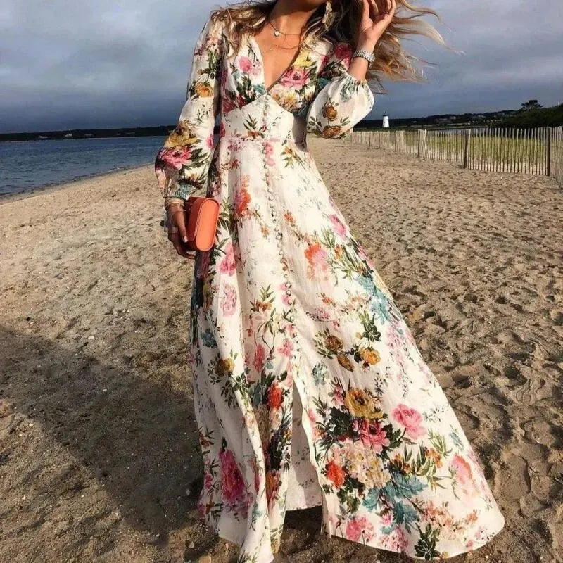 Women's Floral V-Neck Long Sleeve Maxi Dress in cream with pink roses and botanical print on beach setting
