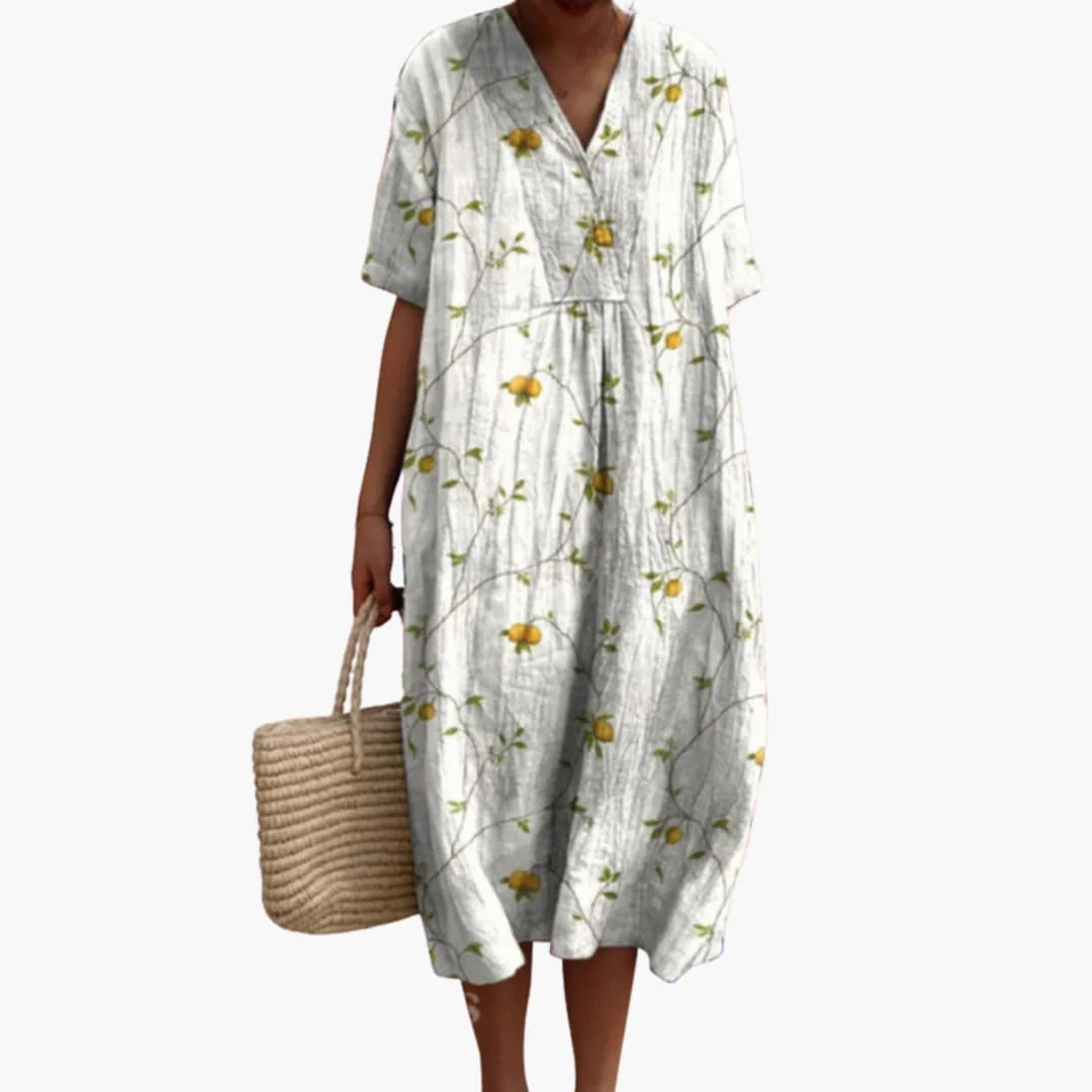 Crinkle-textured floral midi dress showing breathable fabric and relaxed oversized fit