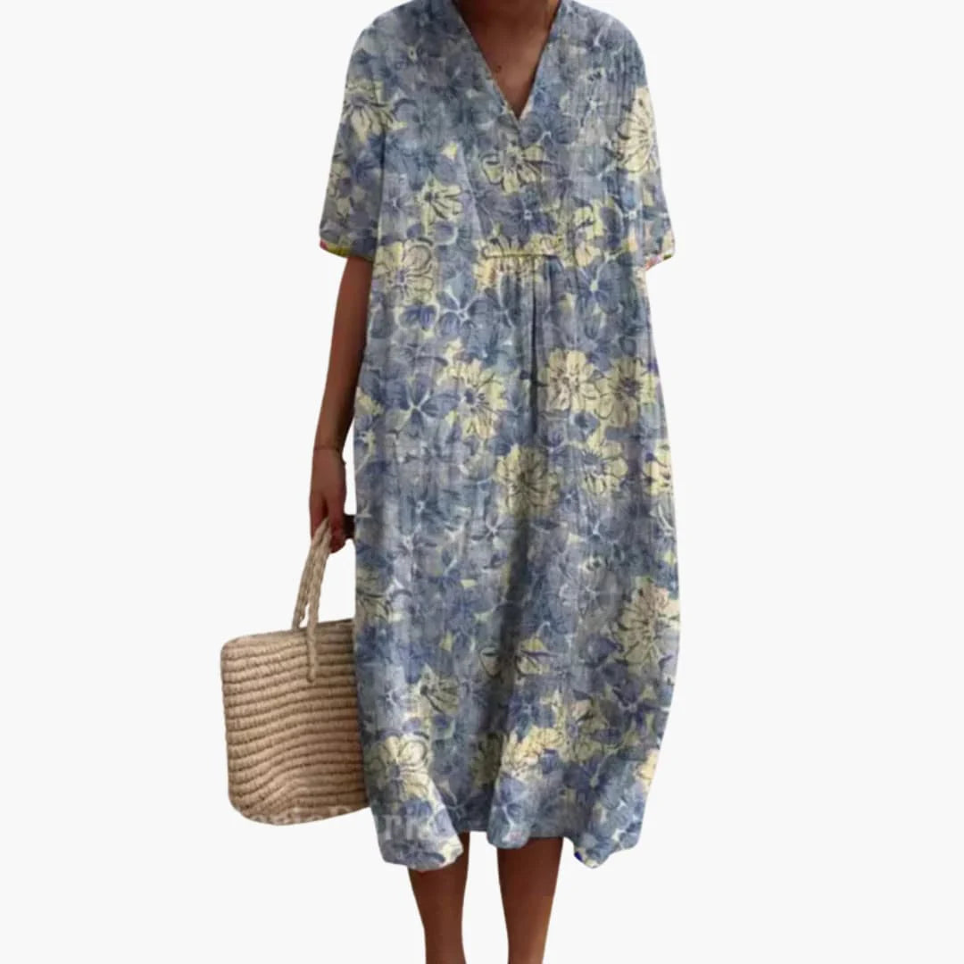 V neckline and short sleeve detail on vibrant floral print midi dress