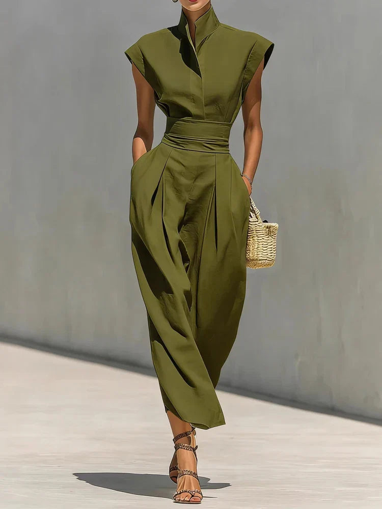 Full-length view of elegant midi dress with smooth drape and tailored silhouette