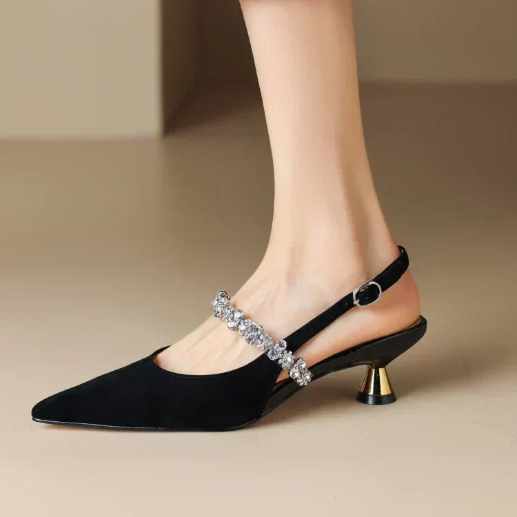 Women's pointed toe heels with crystal strap detail and adjustable slingback shown from multiple angles