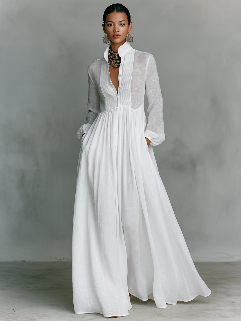 Back view of long sleeve maxi dress showing relaxed straight fit and floor-length hem