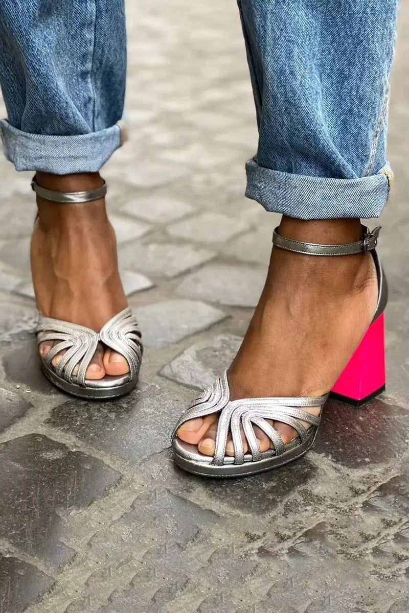 Women's metallic ankle strap sandals with glossy finish and chunky block heel in bold fuchsia color for summer occasions