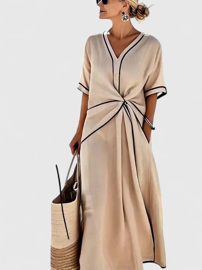 Full-length view of relaxed fit Summer Linen Dress with gathered waist and woven accessories