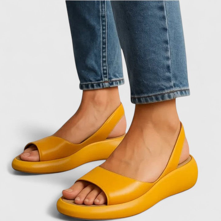 Detail shot of orthopedic sandal footbed highlighting contoured support and shock-absorbing sole construction