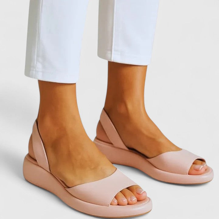 Women's orthopedic sandals in yellow featuring cushioned insole and easy slip-on design for summer wear