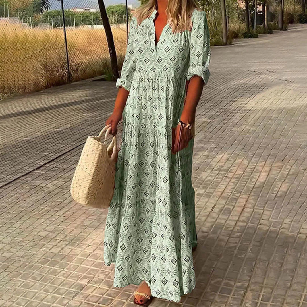 Side view of Maxi Boho Print Dress displaying flowing drape and ankle-length hem