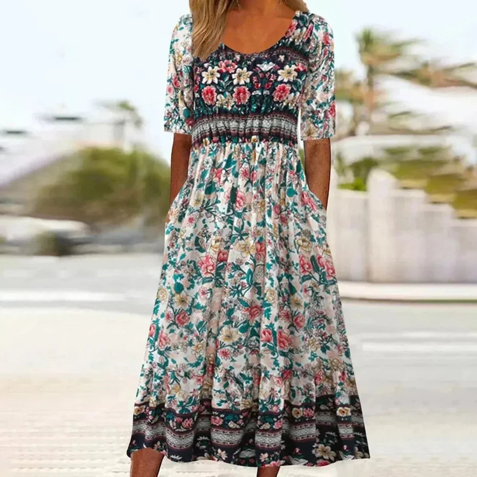 Back view of Boho Print Midi Dress showing continuous print and midi-length skirt drape