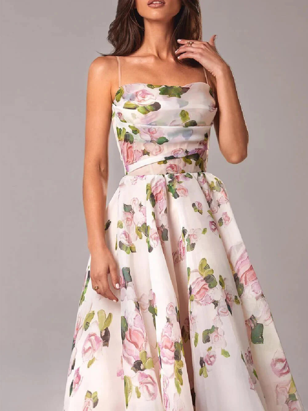Mid-calf length elegant midi dress with structured fabric and romantic rose print for special occasions