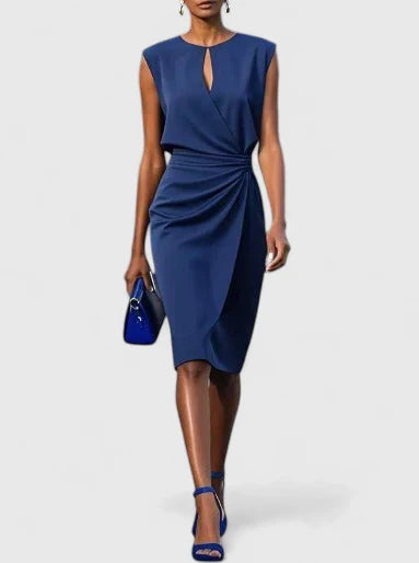 Sophisticated dress in navy blue with keyhole neckline and asymmetric draped waist detail for formal occasions
