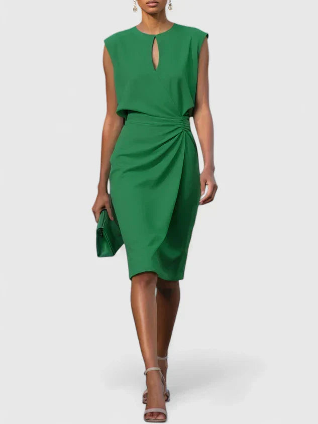 Cocktail sophisticated dress with sleeveless bodice and asymmetric wrap-style waist detail