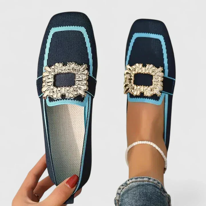 Women's orthopedic loafers in navy with turquoise contrast trim and embellished square buckle at vamp