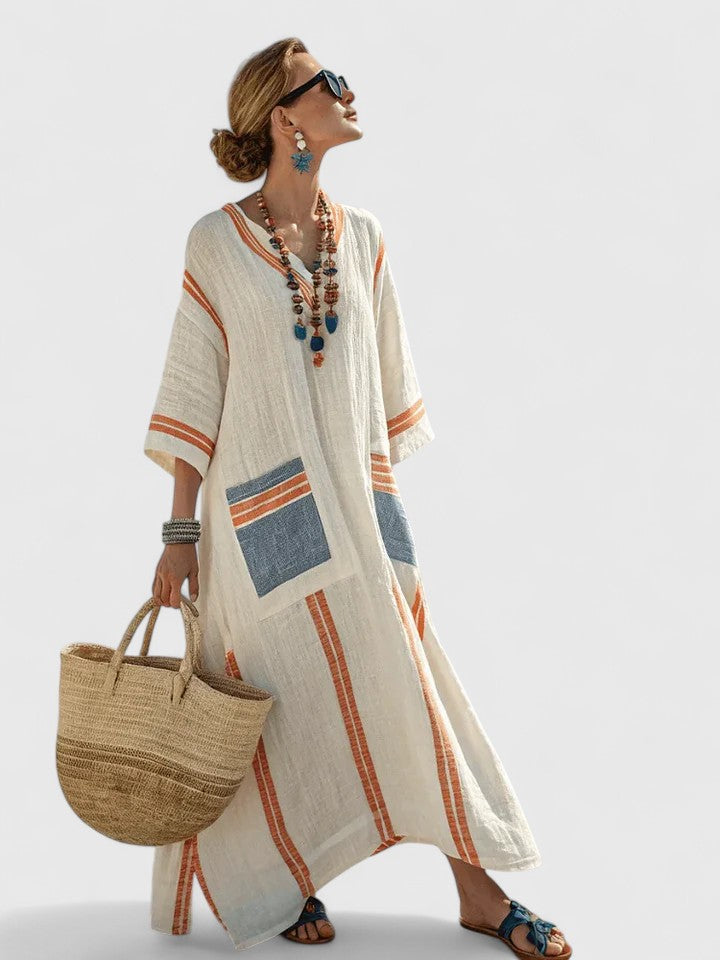 Detail shot of contrast striped trim on sleeve and pocket of Boho Maxi Dress