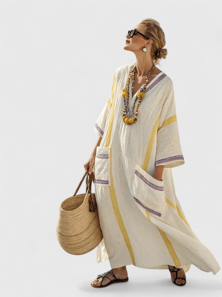 Woman styling Boho Maxi Dress with sandals and statement jewelry for casual wear