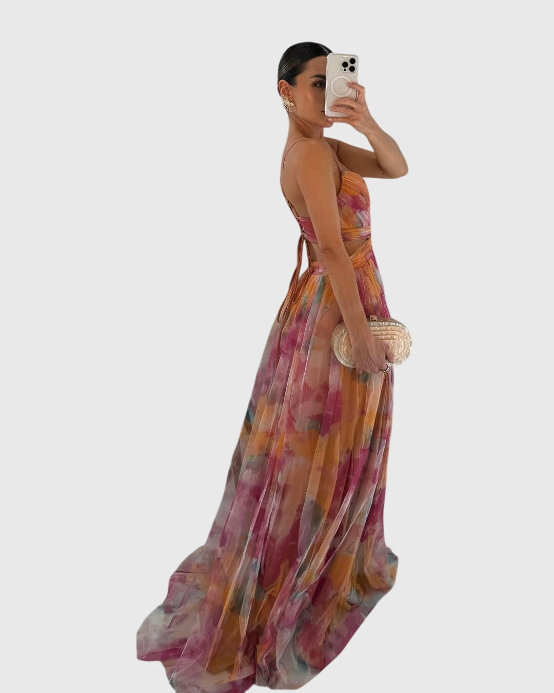 Close-up of floral maxi dress V-neckline and gathered waist detailing