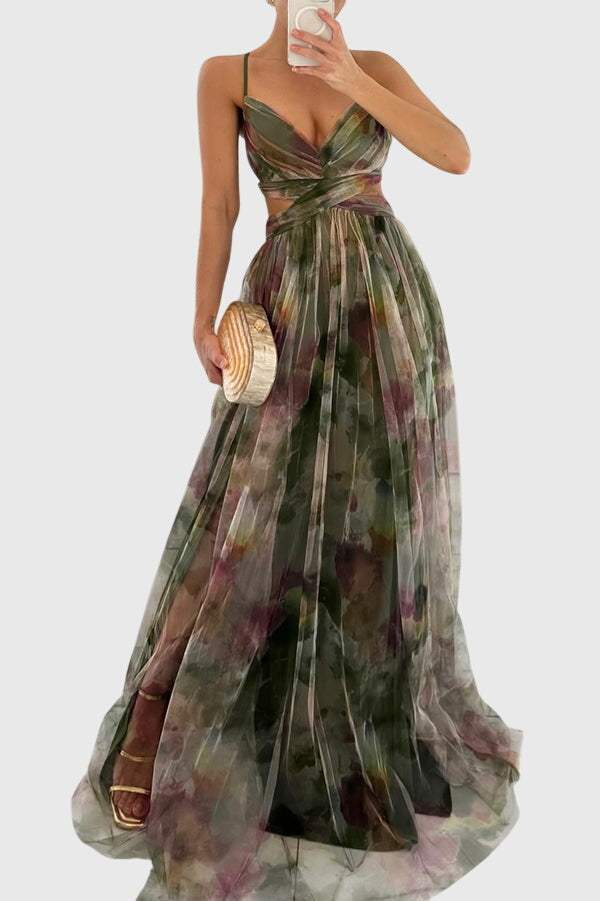 Side angle of floral maxi dress displaying adjustable strap design and floor-length hem