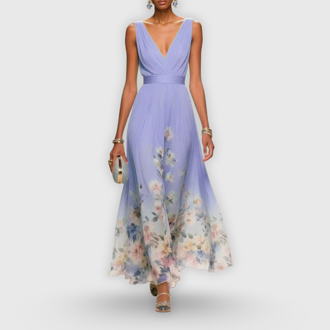 Sleeveless maxi dress with satin waistband and delicate floral pattern across skirt