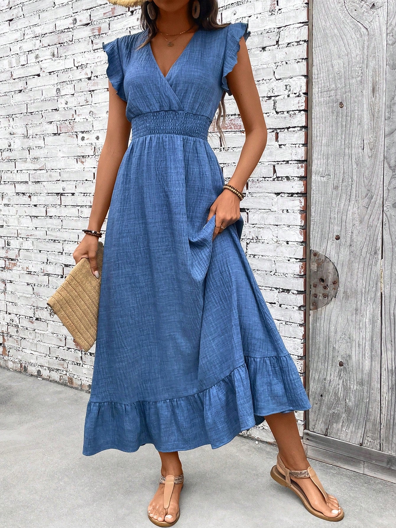 Women's Boho Smocked Waist Maxi Dress in blue with V-neckline, flutter sleeves, smocked waist detail, and tiered ruffle hem for summer wear