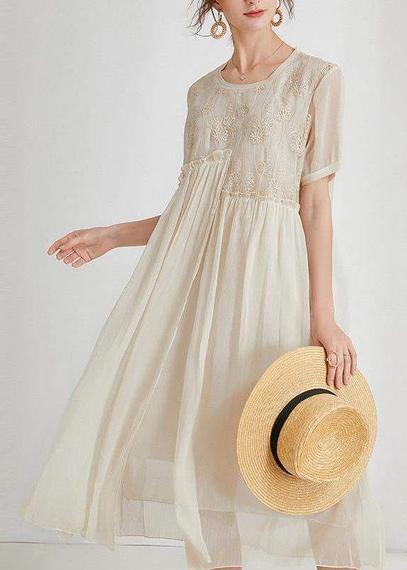 Boho Chiffon Summer Maxi Dress in beige with embroidered floral bodice and flowing ankle-length skirt