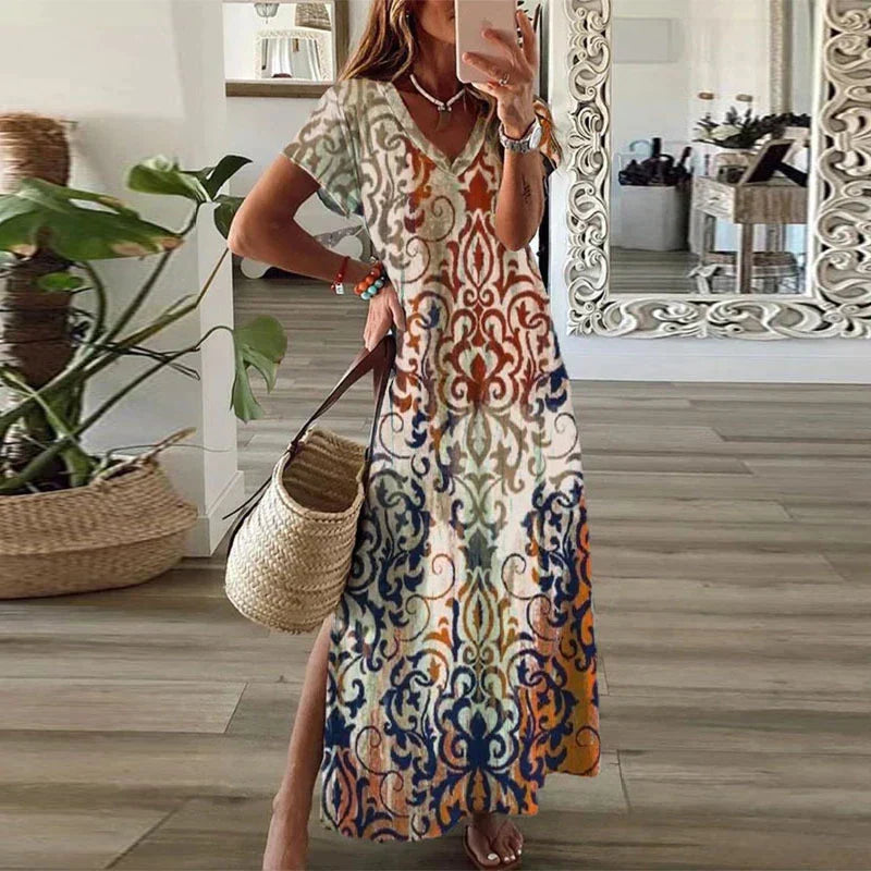 Women's Summer Boho Printed Maxi Dress with intricate scrollwork pattern in earth tones and blues, featuring V-neckline and flowing silhouette