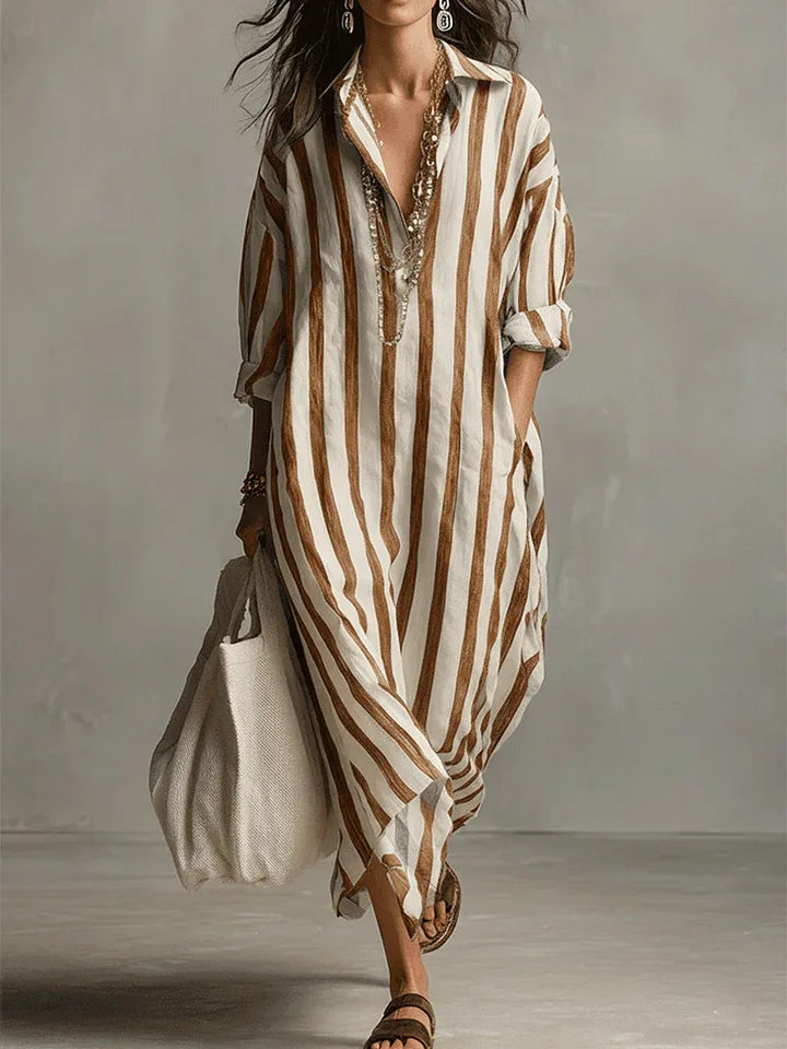 Detail shot of roll-tab three-quarter sleeves on Linen Long Shirt Dress with button closure